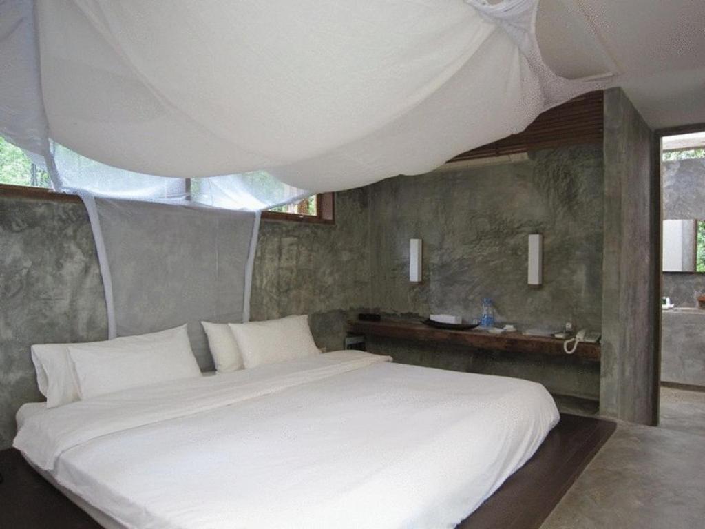 Chambre Double ou Lits Jumeaux Deluxe – Vue sur Jardin